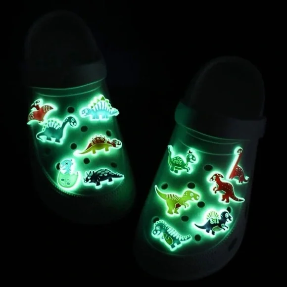 CROCS || 12pcs DINOSAUR SHOE CHARMS GLOW IN THE DARK || NWT ✨ - Picture 1 of 2